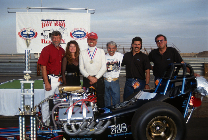 Bill Dunlap nipped Sam Chastain's beautiful entry in the Top Fuel final, 7.09 to 7.16