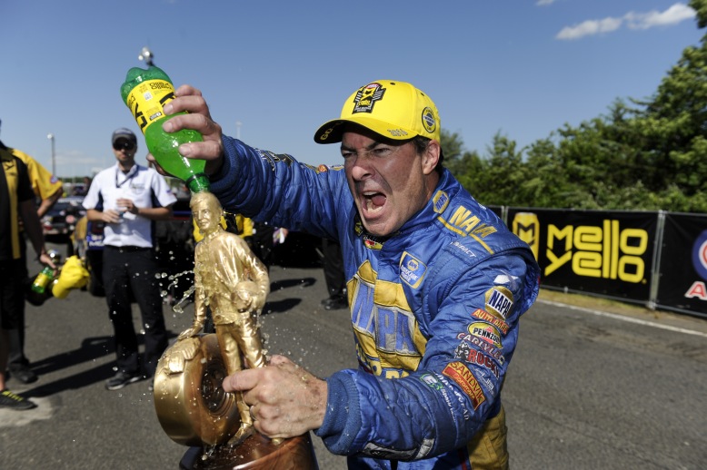 Few drivers enjoy a victory as much as 64-time winner Ron Capps, who’s always happy to share a celebratory Mello Yello with his pal Wally.
