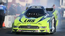 Tim Wilkerson's Funny Car explodes in a fireball in round one—but still advances